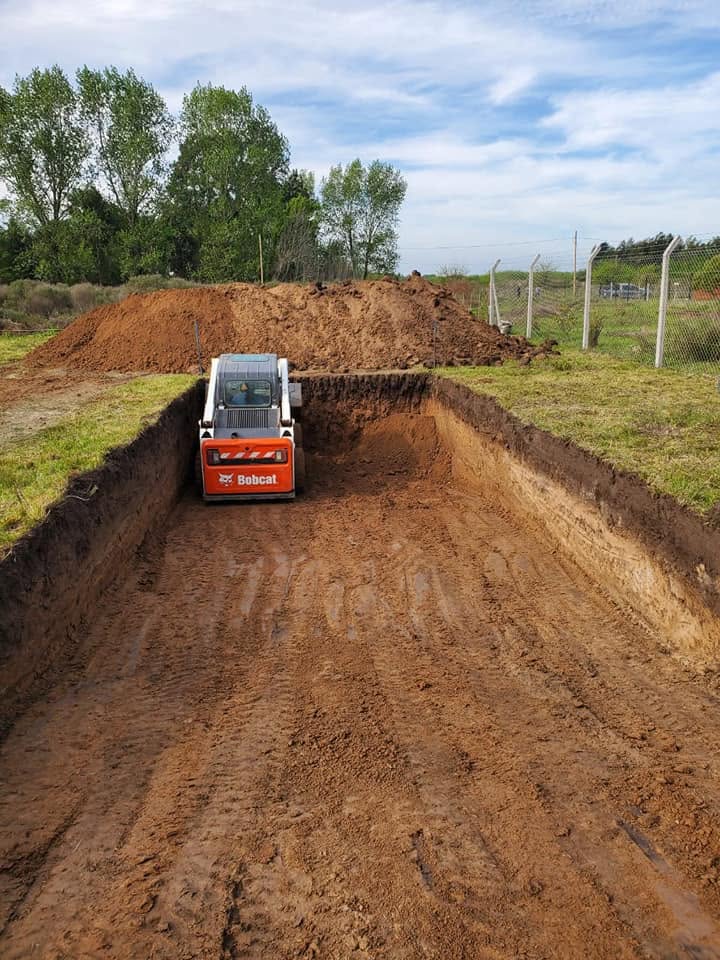 Excavación para piscina con minicargadora